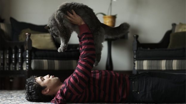 Hombre con gato