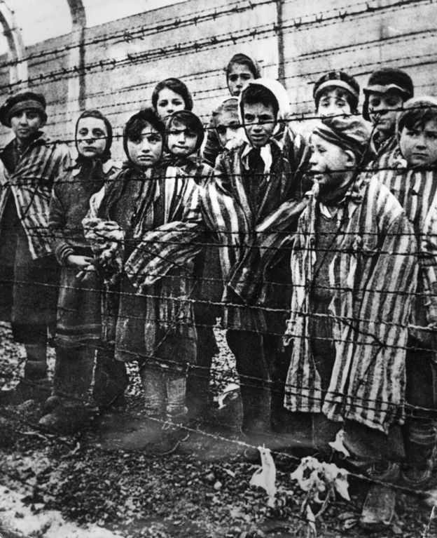 A group of child survivors at Auschwitz-Birkenau on the day of the camp’s liberation by the Red Army, 27 January 1945