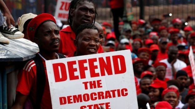 Protestors call for the removal of President Jacob Zuma outside court in Pretoria, South Africa, November 2, 2016.