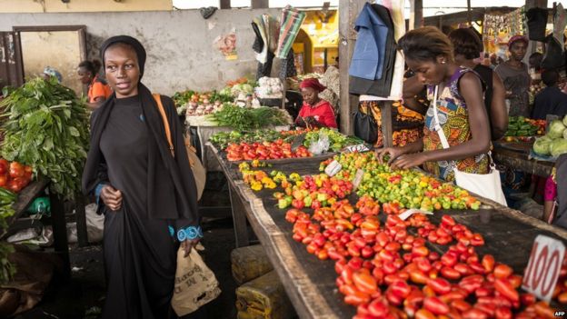 Women shop for vegetables at a market in the Poto Poto district of the Congolese capital Brazzaville, on July 22, 2015