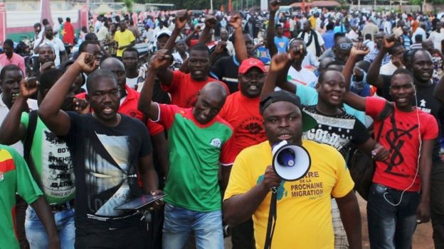 Protesters chant slogans against the presidential guard in Ouagadougou, Burkina Faso, September 16, 2015