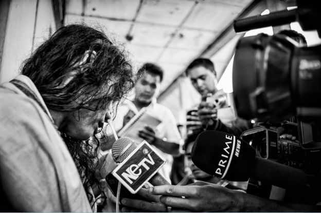 Surrounded by local press looking for a comment on the latest politcal upheaval from Irom Sharmila, June 13, 2013.