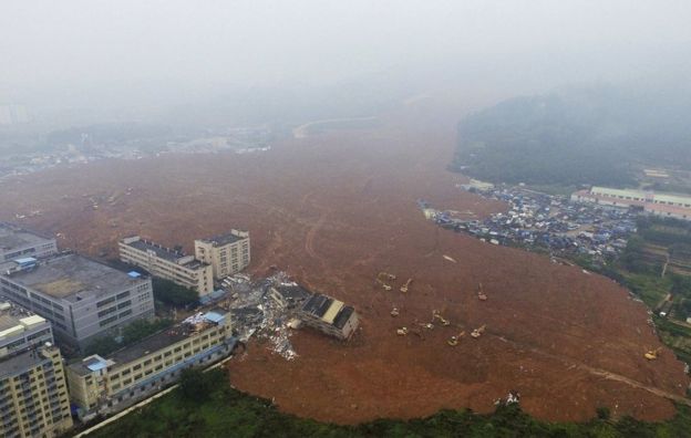 The landslide has covered a vast area of 380,000 sq m (455,000 sq yards) / BBC