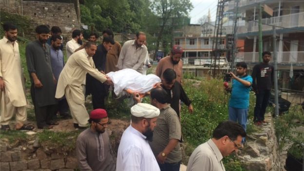 Mourners at the Maria Sadaqat's funeral