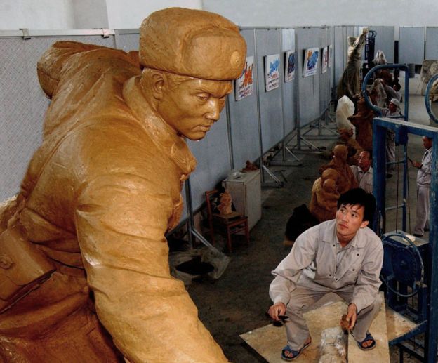 Mansudae artist working on sculpture, 2004