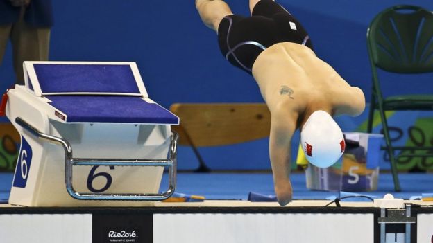 Qing Xu of China competes in the Men's 50m freestyle