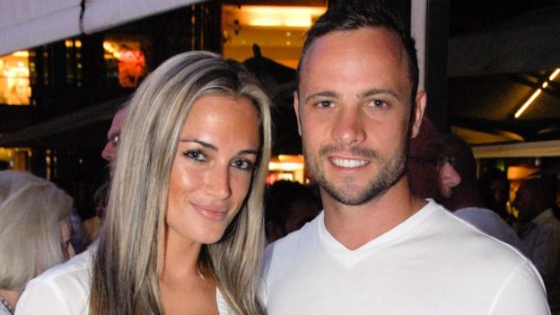 Reeva Steenkamp and Oscar Pistorius smile for the camera