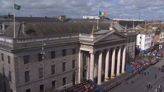 The Irish tricolour was lowered to half mast above Dublin's General Post Office (GPO) - once the rebels' headquarters