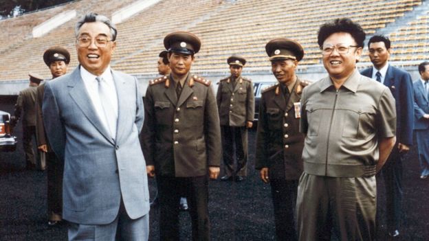 Photo taken in 1992 shows Kim Jong-Il (right) and then-leader, Kim Il-Sung (left), inspecting a football ground in Pyongyang