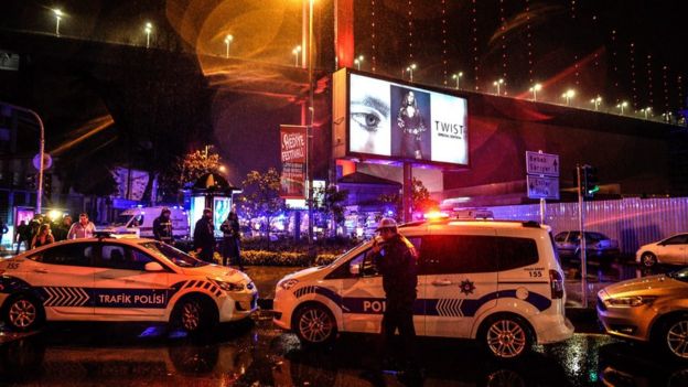 Police secure the area after a gun attack on Reina, a popular night club in Istanbul