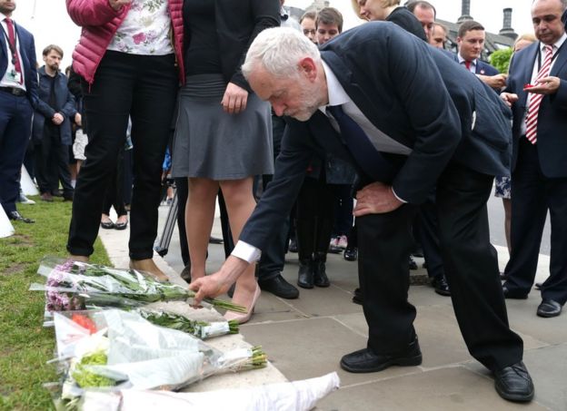 Jeremy Corbyn lays a floral tribute at Westminster