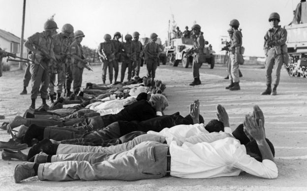 GAZA STRIP:Palestinians surrender to Israeli soldiers in June 1967 in the occupied territory of the West Bank. On 05 June 1967, Israel launched preemptive attacks against Egypt and Syria. In just six days, Israel occupied the Gaza Strip and the Sinai peninsula of Egypt, the Golan Heights of Syria, and the West Bank and Arab sector of East Jerusalem (both under Jordanian rule), thereby giving the conflict the name of the Six-Day War