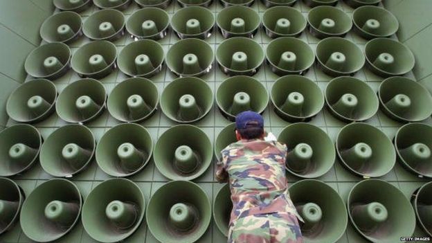 JUNE 16: A South Korean soldier takes down a battery of propaganda loudspeakers on the border with North Korea in Paju on 16 June 2004 in Paju, South Korea.
