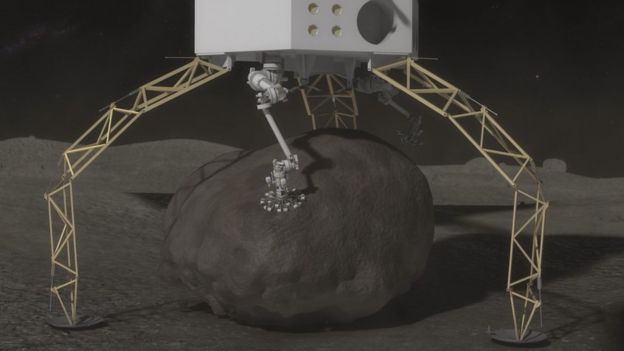 Una sonda recogiendo una enorme roca