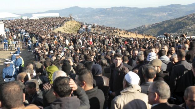 Relatives and people attend the funeral of Hocine Ait Ahmed, the Algerian leader of the Front of Socialist Forces party (FFS), at his hometown