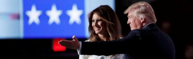 Donald Trump greets his wife Melania on stage