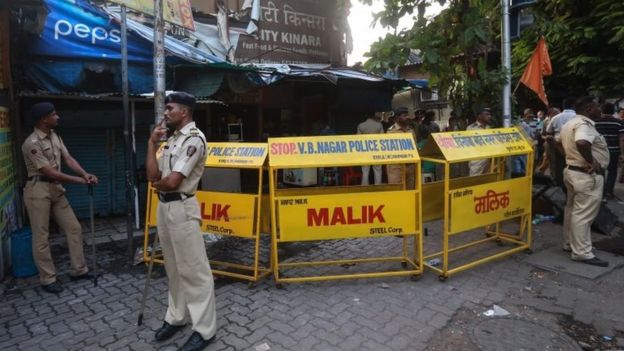 Indian police officials cordon off the Hotel City Kinara