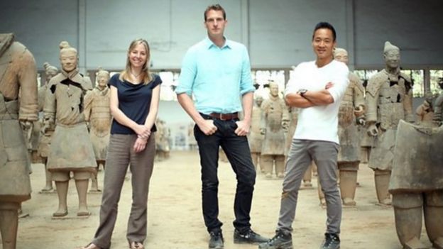 BBC presenters standing in the middle of the Terracotta Army