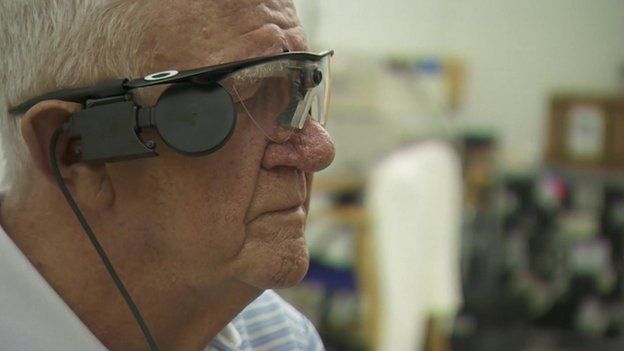 Visual signals from the camera on Ray's glasses are sent to the implant at the back of his retina