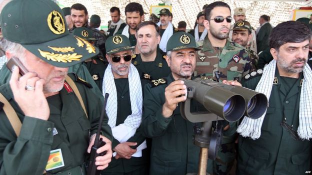 Iranian Revolutionary Guards commander Mohammad Ali Jafari (C), monitors ground, air and naval drills near the Strait of Hormuz on 24 April 2010