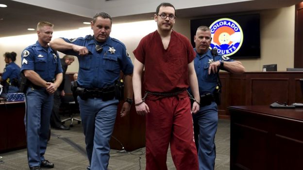 James Holmes leaves court for the last time before beginning his life sentence