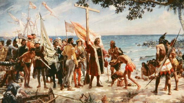 Una pintura muestra la llegada de Colón en una de las islas del Caribe.