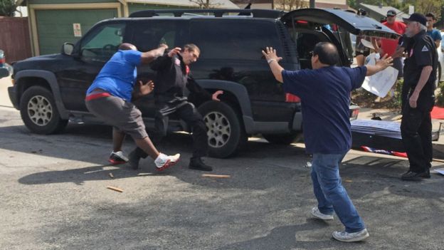 This photo provided by the Center for the Study of Hate ^ Extremism shows, a counter-protester, second from left, and a Ku Klux Klansman, center, scuffling as members of the KKK tried to start an anti-immigrant rally at Pearson Park in Anaheim on Saturday, Feb. 27, 2016