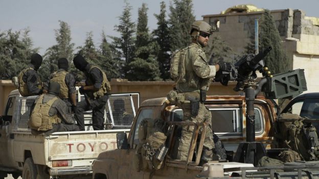 Armed men identified by Syrian Democratic forces as US special operations forces are seen in the northern Syrian province of Raqqa on May 25, 2016.