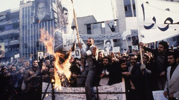 An effigy of the deposed shah of Iran is burned at a demonstration outside the US embassy in Tehran in 1979