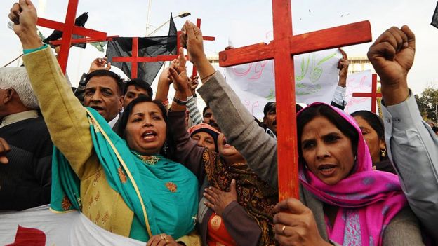 Members of the Pakistan Christian Democratic alliance march during a protest in Lahore on 25 December 2010 in support of Asia Bibi