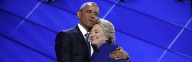 US President Barack Obama greets Democratic presidential nominee Hillary Clinton at the end of the third day of the Democratic convention.