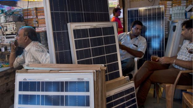 Solar panels on display in a market in New Delhi - October 2015