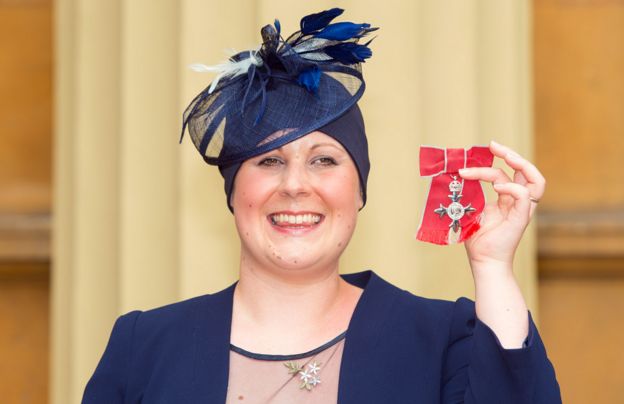 Kate Granger holds her MBE which was awarded to her by the Prince of Wales at an investiture ceremony at Buckingham Palace on June 12 , 2015