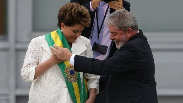 A file picture dated 01 January 2011 of then Brazilian President Dilma Rousseff (L) receiving congratulations by outgoing President Luiz Inacio Lula da Silva (R) at the Planalto Palace in Brasilia, Brazil, 01 January 2011