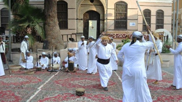 Saudi men performing traditional Alemezar dance