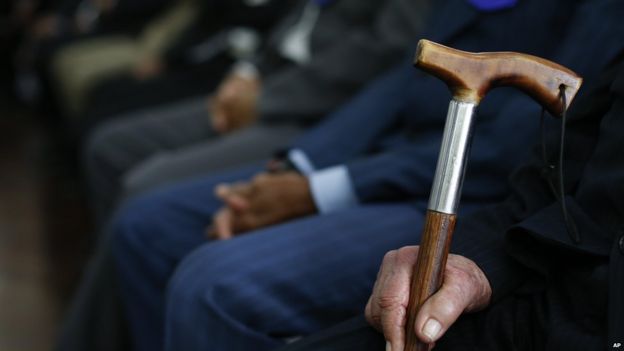 A contestant holds his walking stick at Sao Paulo's 