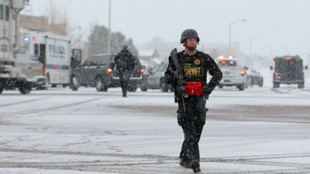 Armed police secure the scene outside a Planned Parenthood facility in Colorado Springs. 27 Nov 2015