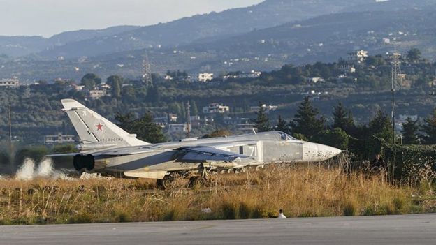 A Sukhoi Su-24 fighter jet taxis on the tarmac at the Humaymim air base near Latakia, Syria (11 November 2015)