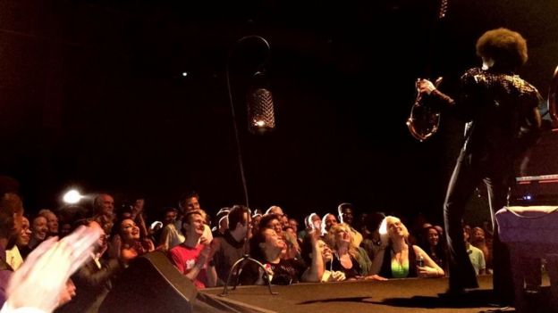 Prince performing with Simon Farmer's guitar