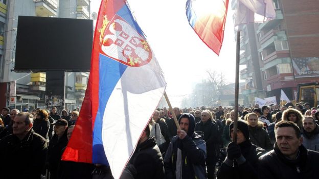 Ethnic Serbs protested in northern Kosovo, waving Serbian flags