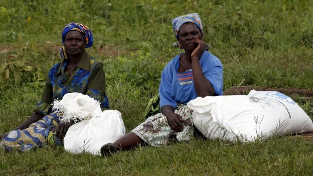 Malawian women with food aid provided by the World Food Programme