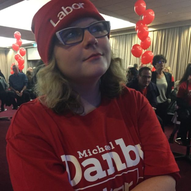 A Labor supporter watches results roll in at the Moonee Valley Racing Club in Bill Shorten's electorate