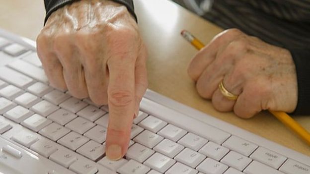 Pensioner using computer