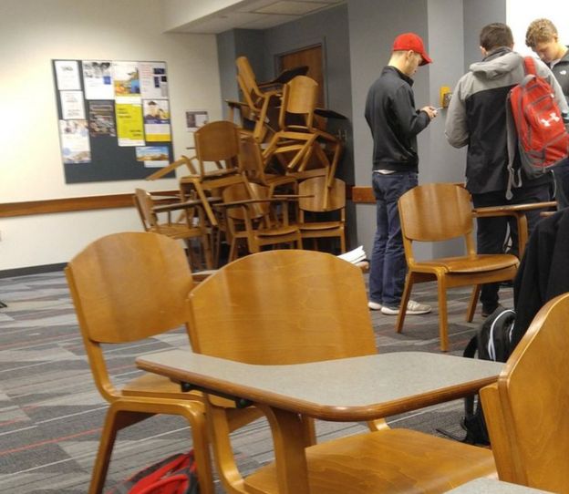Students barricade a classroom door amid campus lockdown at Ohio State University