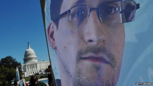 Image of Edward Snowden on a banner
