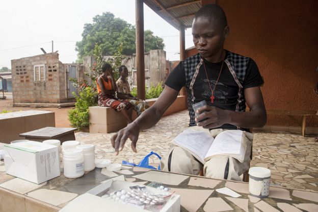 Getting medication ready at a Saint Camille centre in Benin