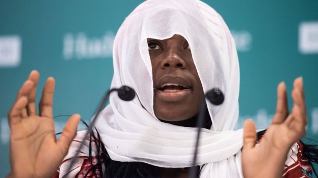 One of the escaped schoolgirls kidnapped by Boko Haram shares the story of her capture and escape during a press conference on 19 September 2014 at the Hudson Institute in Washington DC, the US