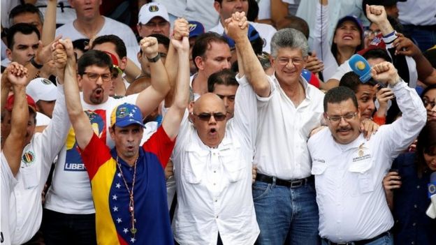 Venezuelan opposition leaders Henrique Capriles (L), Jesus Torrealba, secretary of Venezuela's coalition of opposition parties (MUD) and Henry Ramos Allup (2nd R), President of the National Assembly and deputy of the Venezuelan coalition of opposition parties (MUD), take part in a rally to demand a referendum to remove Venezuela's President Nicolas Maduro, in Caracas, Venezuela, September 1, 2016