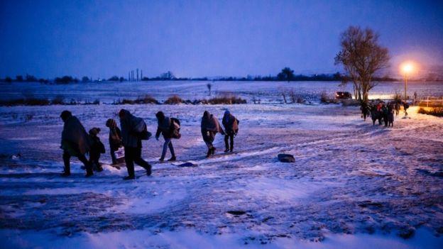 Refugees cross the Macedonian border into Serbia, 17 January