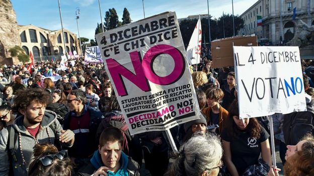 Demonstrators hold banners during a demonstration of the 'C'e chi dice no' (some say no) movement calling for a 'no' vote in the referendum on constitutional reform